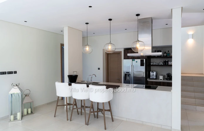 Beau Champ - Luxueux duplex de 4 chambres avec vue sur le golf et la mer